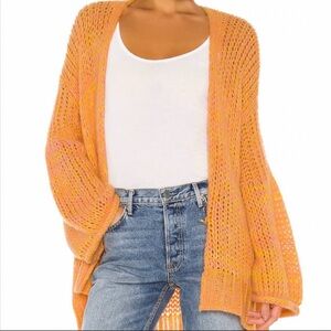 Free People Oversized Orange/yellow sweater. Size Medium 
Gently used